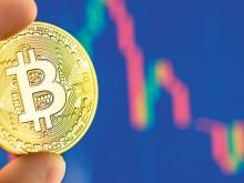 Биткойнът с нова рекордна стойност, надхвърля 58 хил. долара