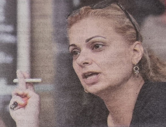 The host of BNT is unrecognizable!  No makeup and smoking a cigarette