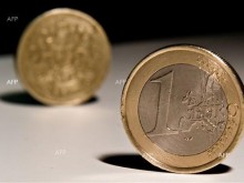 Еврото се задържа малко над паритета спрямо долара