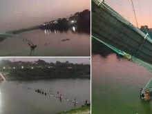 Най-малко 60 души загинаха при срутване на висящ мост в Индия