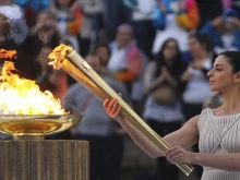 Организаторите на Олимпийските игри приеха олимпийския огън