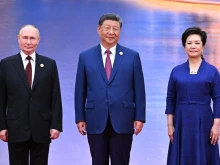 Ушаков: Путин и Си Дзинпин обсъдиха последните руско-американски преговори