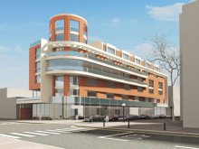 Декоративна кула подчертава ъгловия обем на жилищна сграда в Пловдив