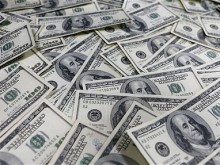 Доларът поскъпва с 5% до средата на 2015-та