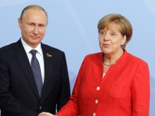 Меркел и Путин се срещат днес край Берлин