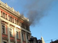 Гори банка на Главната