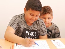 С швейцарска помощ децата на "Столипиново" учат български